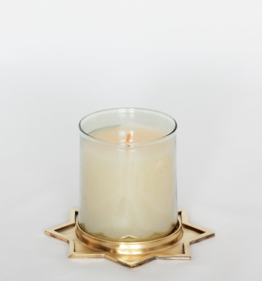 Scented candle with brass base